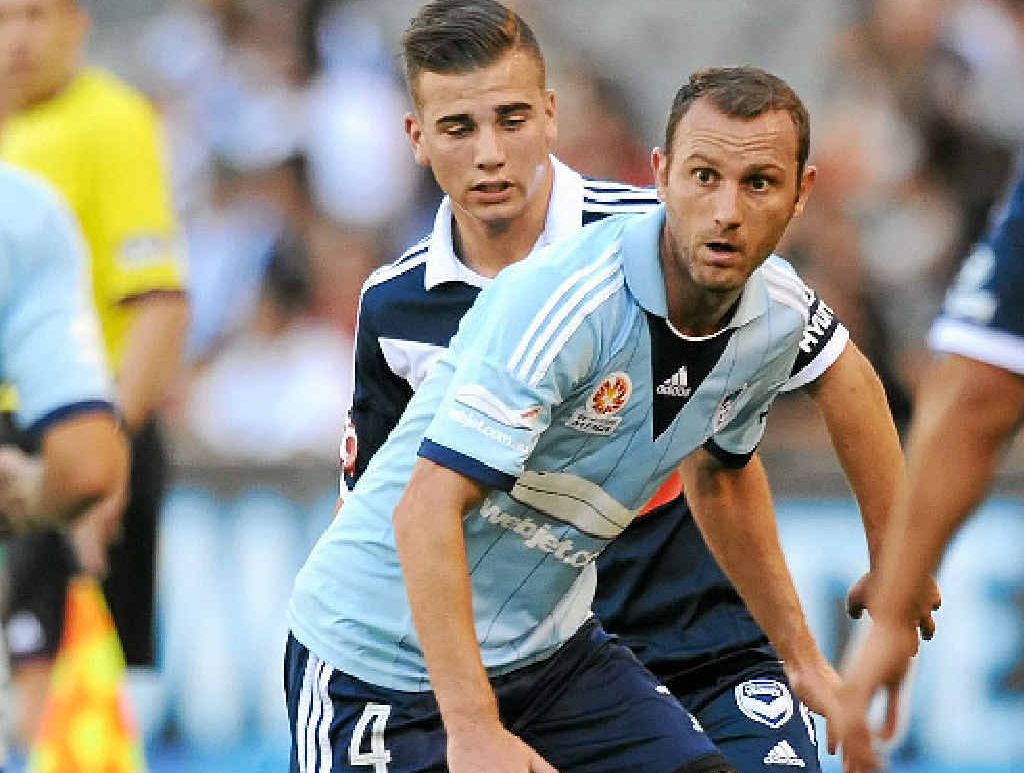 LOOKING AHEAD: Sydney’s Ranko Despotovic breaks clear of Victory rival Dylan Murnane during yesterday’s clash at Etihad Stadium LOOKING AHEAD: Sydney’s Ranko Despotovic breaks clear of Victory rival Dylan Murnane during yesterday’s clash at Etihad Stadium